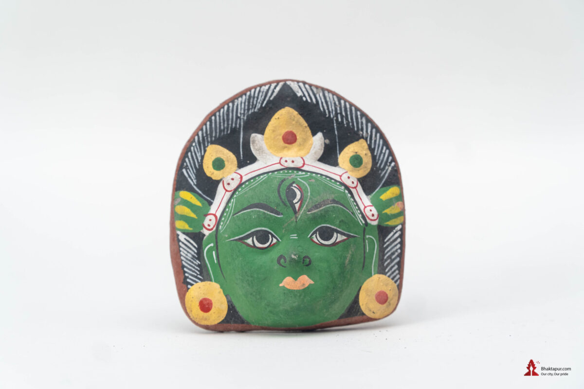 miniature clay mask of Bhadrakali