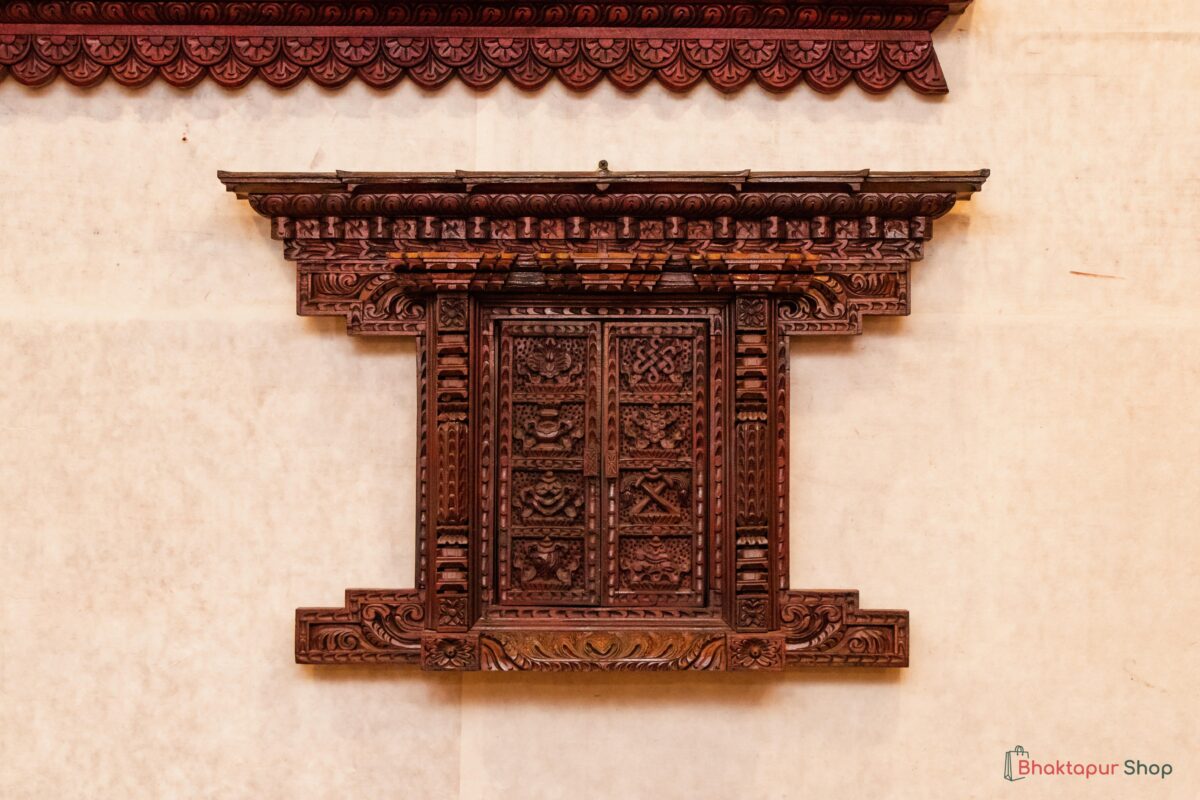 Miniature wooden doors with Astamangal symbols for decoration