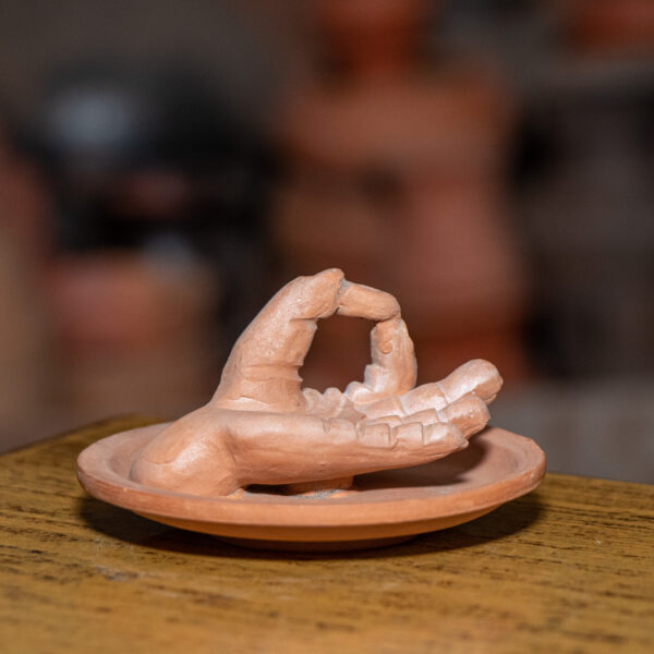 Hand shaped clay pen stand