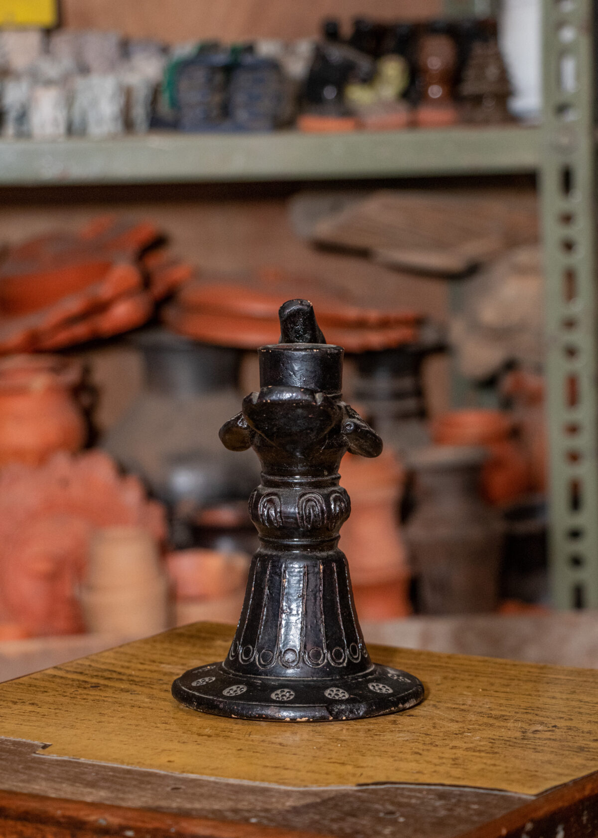 Peacock featured terracotta candle stand
